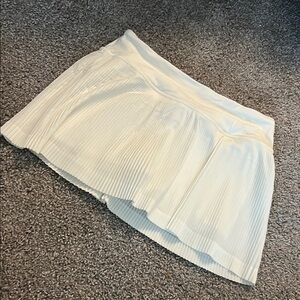 White pleated skirt
